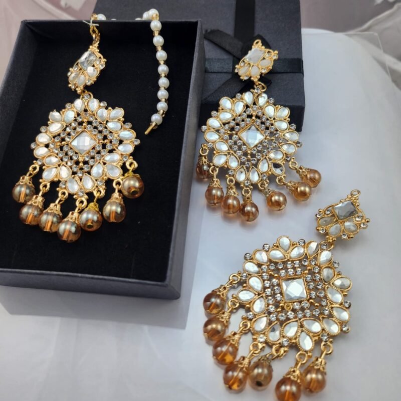 bridal earrings online, wedding jewelry Pakistan, partywear earrings, mehndi jewelry, engagement earrings, festive jewelry online, statement earrings for brides, affordable bridal set, designer look earrings under 2000, gold plated earrings Pakistan, kundan earrings, chandbali earrings, jhumka earrings, pearl drop earrings, antique style earrings, vintage gold tone jewelry, mirrorwork earrings, stone studded earrings, zircon earrings Pakistan, artificial jewelry online, lehenga accessories, shalwar kameez jewelry, formal party accessories, reception earrings, cocktail party jewelry, evening wear earrings, handcrafted jewelry Pakistan, trendy earrings 2025, budget friendly jewelry, best artificial jewelry Pakistan, gift earrings for her, khubsurat kundan earrings, dulhan ki earrings, sasti bridal earrings online, gold tone earrings kharidain, buy jewelry online Pakistan.
