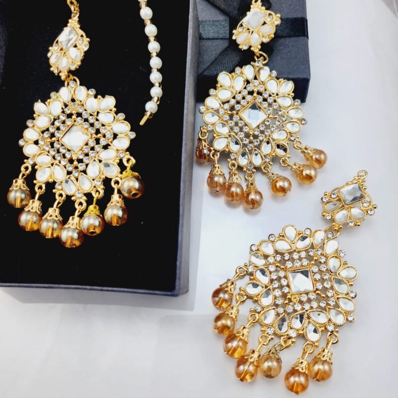 bridal earrings online, wedding jewelry Pakistan, partywear earrings, mehndi jewelry, engagement earrings, festive jewelry online, statement earrings for brides, affordable bridal set, designer look earrings under 2000, gold plated earrings Pakistan, kundan earrings, chandbali earrings, jhumka earrings, pearl drop earrings, antique style earrings, vintage gold tone jewelry, mirrorwork earrings, stone studded earrings, zircon earrings Pakistan, artificial jewelry online, lehenga accessories, shalwar kameez jewelry, formal party accessories, reception earrings, cocktail party jewelry, evening wear earrings, handcrafted jewelry Pakistan, trendy earrings 2025, budget friendly jewelry, best artificial jewelry Pakistan, gift earrings for her, khubsurat kundan earrings, dulhan ki earrings, sasti bridal earrings online, gold tone earrings kharidain, buy jewelry online Pakistan.