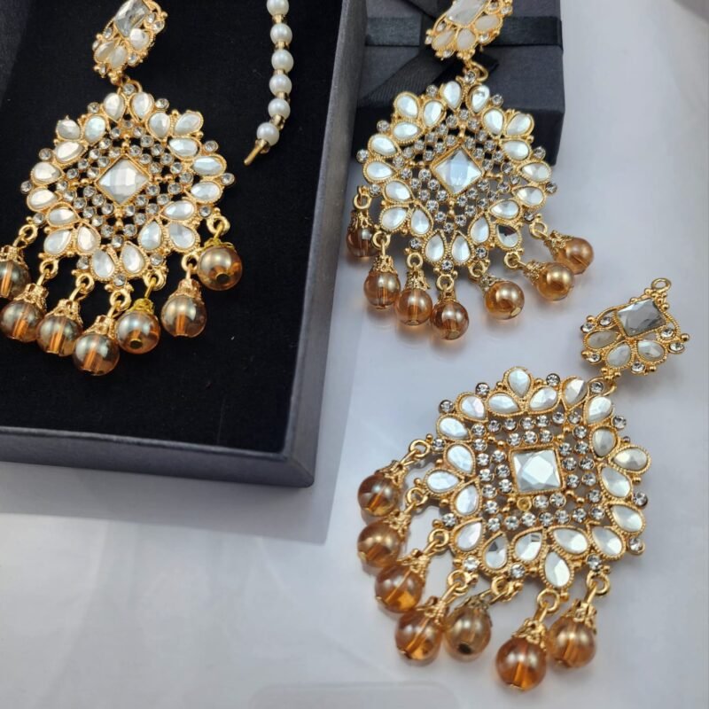 bridal earrings online, wedding jewelry Pakistan, partywear earrings, mehndi jewelry, engagement earrings, festive jewelry online, statement earrings for brides, affordable bridal set, designer look earrings under 2000, gold plated earrings Pakistan, kundan earrings, chandbali earrings, jhumka earrings, pearl drop earrings, antique style earrings, vintage gold tone jewelry, mirrorwork earrings, stone studded earrings, zircon earrings Pakistan, artificial jewelry online, lehenga accessories, shalwar kameez jewelry, formal party accessories, reception earrings, cocktail party jewelry, evening wear earrings, handcrafted jewelry Pakistan, trendy earrings 2025, budget friendly jewelry, best artificial jewelry Pakistan, gift earrings for her, khubsurat kundan earrings, dulhan ki earrings, sasti bridal earrings online, gold tone earrings kharidain, buy jewelry online Pakistan.