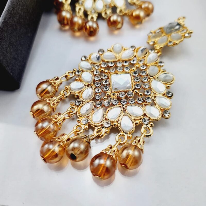 bridal earrings online, wedding jewelry Pakistan, partywear earrings, mehndi jewelry, engagement earrings, festive jewelry online, statement earrings for brides, affordable bridal set, designer look earrings under 2000, gold plated earrings Pakistan, kundan earrings, chandbali earrings, jhumka earrings, pearl drop earrings, antique style earrings, vintage gold tone jewelry, mirrorwork earrings, stone studded earrings, zircon earrings Pakistan, artificial jewelry online, lehenga accessories, shalwar kameez jewelry, formal party accessories, reception earrings, cocktail party jewelry, evening wear earrings, handcrafted jewelry Pakistan, trendy earrings 2025, budget friendly jewelry, best artificial jewelry Pakistan, gift earrings for her, khubsurat kundan earrings, dulhan ki earrings, sasti bridal earrings online, gold tone earrings kharidain, buy jewelry online Pakistan.